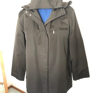 Black hooded raincoat with baby blue satin lining.